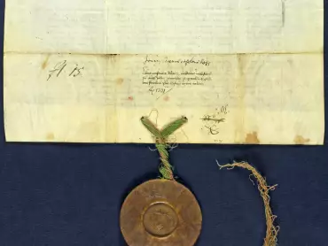 Státní okresní archiv v Olomouci, Archiv města Olomouce, fond M-1-1, Listiny, inv. č. 16, pergamen, 37,5 × 21 cm, plika o šířce 4 cm, kontrasigillovaná rytířská pečeť je přivěšena na zelených a červených hedvábných nitích.