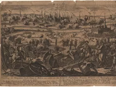 Olomouc na Moravě. Představení královského města Olomouce na Moravě, jak toto bylo královskými pruskými trupami obleženo a bombardováno od 27. května do 2. července 1758 Překlad legendy: „Objasnění číslic: 1. Jeho královské pruské Veličenstvo, jak pohlíží na obléhání. 2. Jeho Excelence generálporučík (August Wilhelm) von Treskow (1720–1797). 3. Generál (spr. plukovník Franz von) le Noble (1707–1772). 4. Zřízené bombardování a oheň z moždířů. 5. Královští pruští lidé. 6. Výpady z pevnosti. Objasnění, kde tato pevnost byla nejvíce poničena: 7. Sv. Blažej. 8. Sv. Kateřina. 9. Kapucínský klášter. 10. Dominikánský klášter a kostel. 11. Jezuitský klášter a kostel. 12. Radnice. 13. Sv. Martin (spr. sv. Mořic). 14. Litovelská brána. Toto je poukázání na nejvýznamnější budovy, přičemž po celou dobu u nich se nacházející sousedstvo mělo stejné neštěstí, a také všechny vnější nebo pevnostní stavby byly takřka úplně zruinovány.“ Mědirytina zhotovená Johannem Martinem Willem (1727–1806) v Augsburgu. Státní okresní archiv v Olomouci, Archiv města Olomouce, fond M 8-34 Sbírka obrazového materiálu a fotografií Olomouc, inv. č. 22. http://digi.archives.cz/da/permalink?xid=31770A92564E11E2A941F04DA234000E&scan=1
